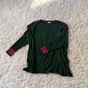 Dark Green Sweater with Pink Accents